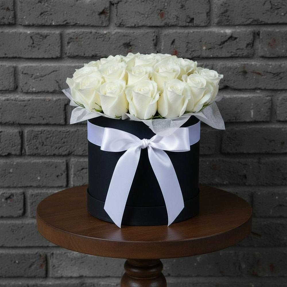 Цветочная композиция из Розы в шляпной коробке в Октябрьский Волгоградской области